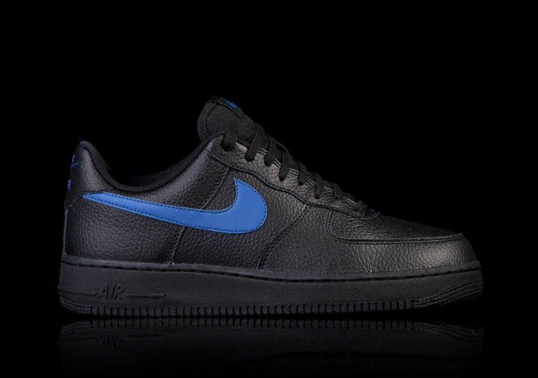 black nikes with blue swoosh
